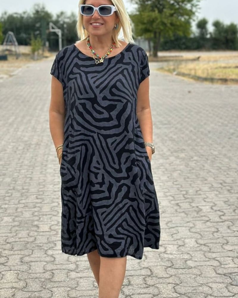 Mira™ – Zomerjurk met ronde hals en elegante print