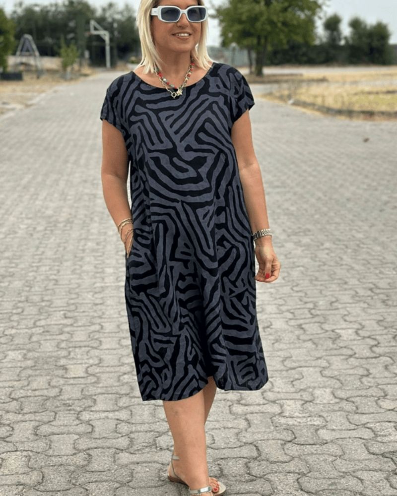 Mira™ – Zomerjurk met ronde hals en elegante print