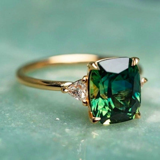 Geluk – Groene zirkonen ring in goud